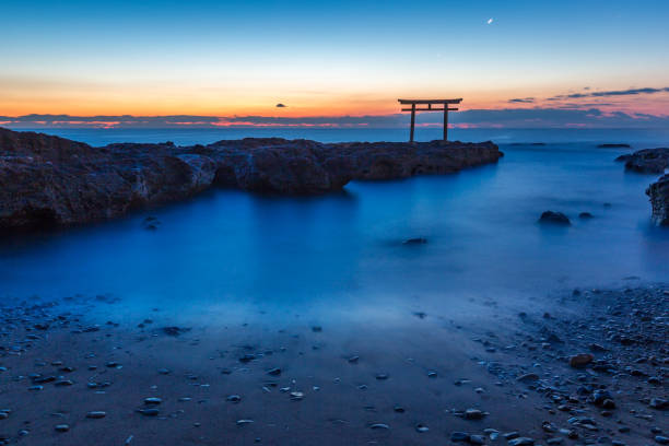 Toroii Ibaraki Japan Toroii Japanese shrine gate sunrise at sea Oarai city , Ibaraki JapanIbaraki, Japan - February 4, 2017: Torii in The Sea at Oarai Isosaki-jinja Shrine. This historic shrine established in 856 enshrines a deity of medicine who bestows happiness and good match. ibaraki prefecture stock pictures, royalty-free photos & images