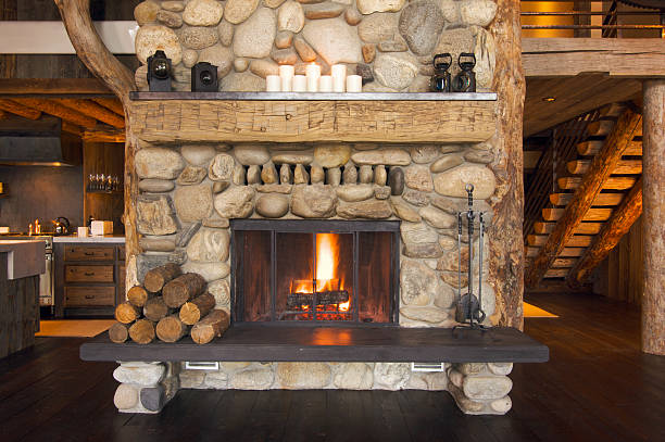 Rustic Fireplace  log cabin stock pictures, royalty-free photos & images