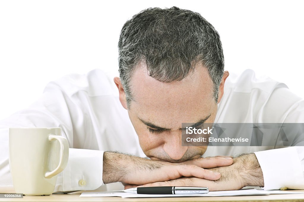 Businessman resting head on hands  Adult Stock Photo