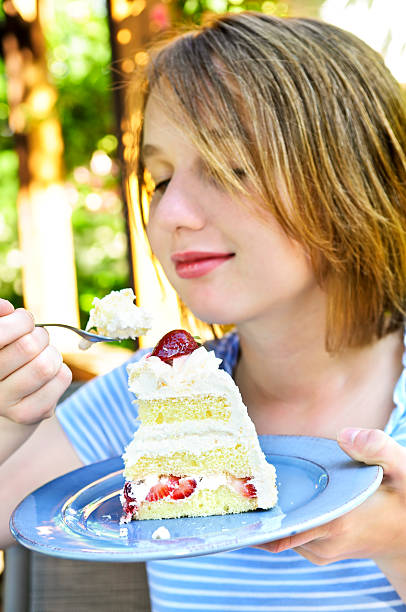 Girl eating a cake