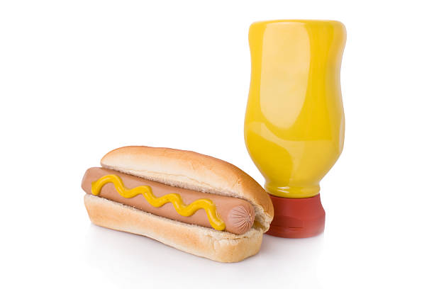 istock Mustard hotdog isolated on white 92007078
