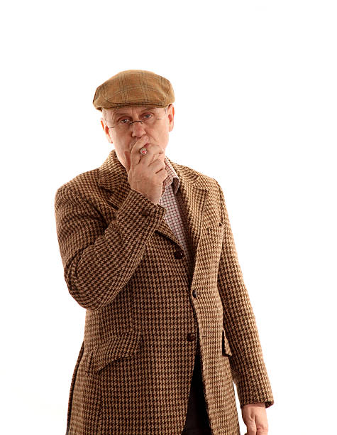 istock Mature man in tweeds smoking a large cigar 92007964