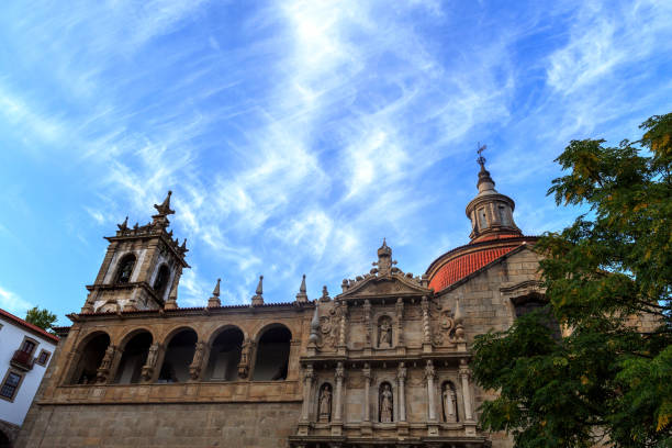 Church of Sao Goncalo against a blue and cloudy sky before sunset time, in Amarante, Portugal