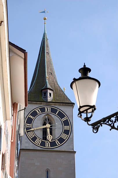 istock Clock face and street lamp 92008053