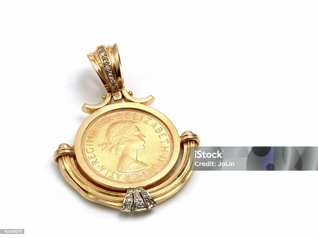 Gold tasto applicata in una spilla - Foto stock royalty-free di Accessorio personale