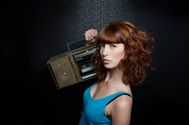 istock Redhead beauty with boombox 92008161