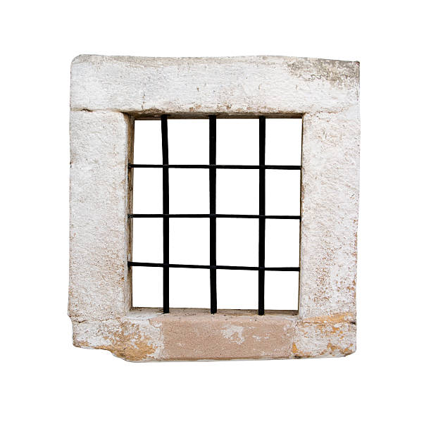 Window of an ancient prison cell  dungeon medieval prison prison cell stock pictures, royalty-free photos & images