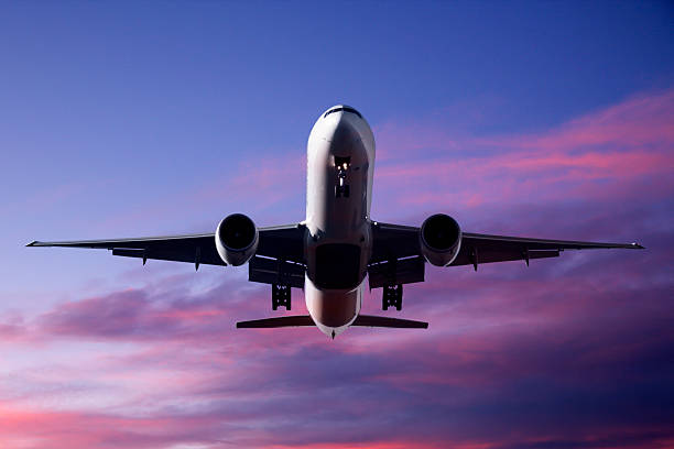 istock Jet Aeroplane Landing Sunset Blue Purple Red Twilight Sky 92008780