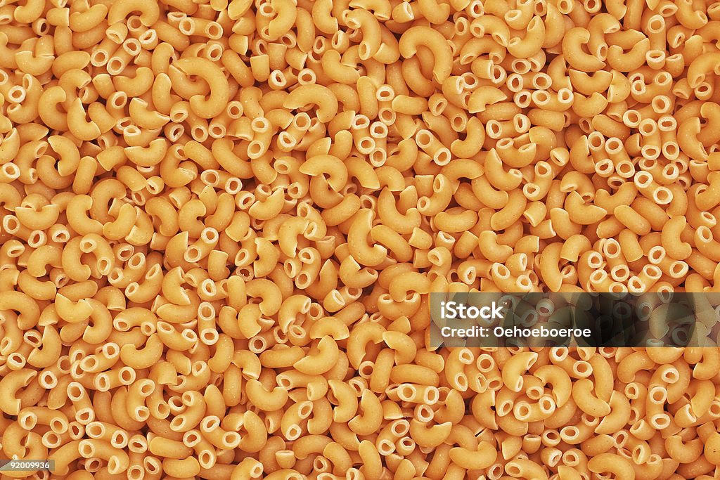 Macaroni background  Elbow Stock Photo