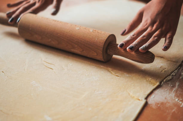istock Working with dough on the wooden table 920103460
