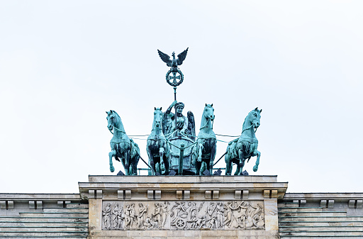 Statue on the top of Brandenburg gate in Berlin, Germany.