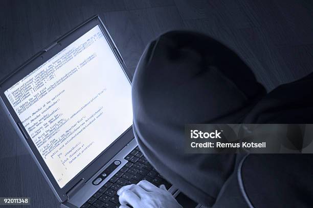 Anonymous Person Hacking Into A Computer Stock Photo - Download Image Now - Color Image, Computer, Computer Hacker