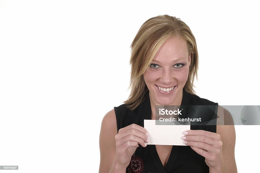 Atractiva mujer sosteniendo tarjetas en blanco - Foto de stock de Adulto libre de derechos