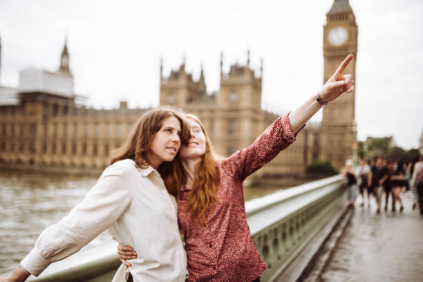 istock lesbian couple kissing at westminster bridge 920123642