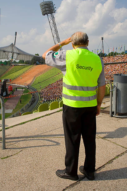 old security guard  doing the wave stock pictures, royalty-free photos & images