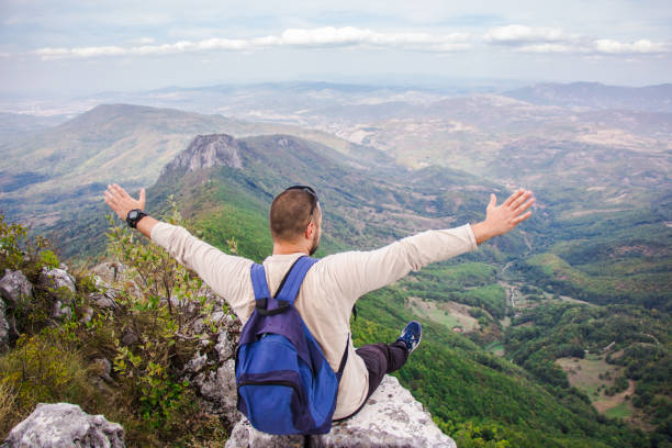 istock Young man on top of the mountain. 920131392
