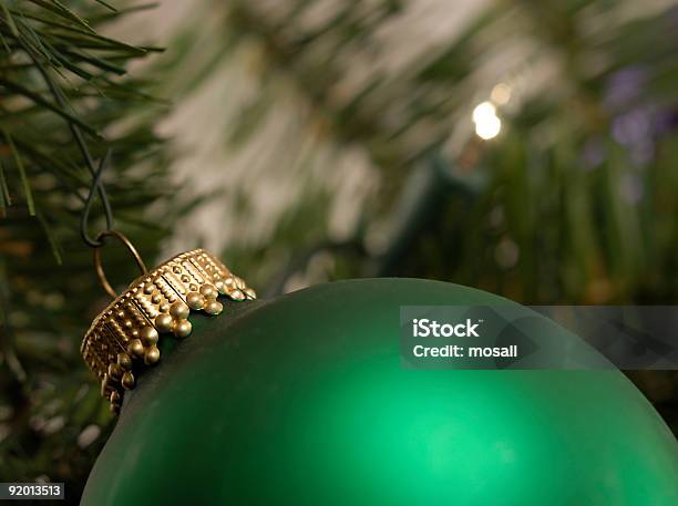 A Christmas Ornament Decoration With An Evergreen Background Stock Photo - Download Image Now
