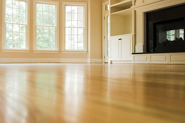 istock An empty living room with hardwood floors 92014851