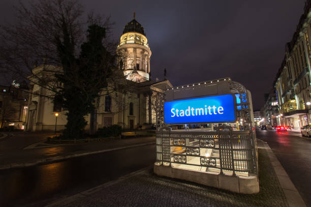 istock gendarmenmarkt and stadtmitte subway sign berlin germany at night 920150640