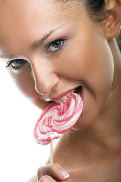 happy woman with a lolly stock photo
