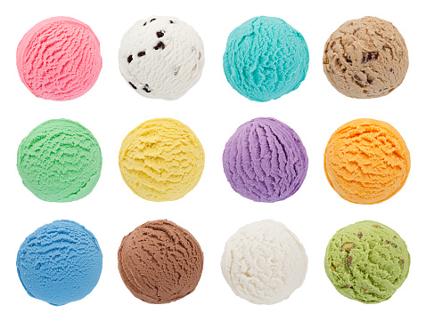 Top view of 12 colorful ice cream scoops isolated on white