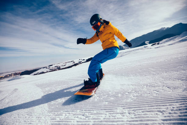 istock one snowboarder snowboarding in winter mountains 920164280