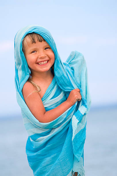 Girl in a blue pareo stock photo