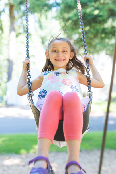 istock Summer Swinging at the Neighborhood Playground! 920171214