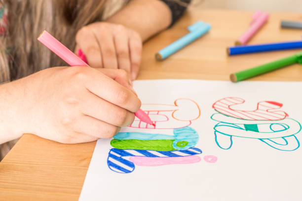 istock Girl hand writing 