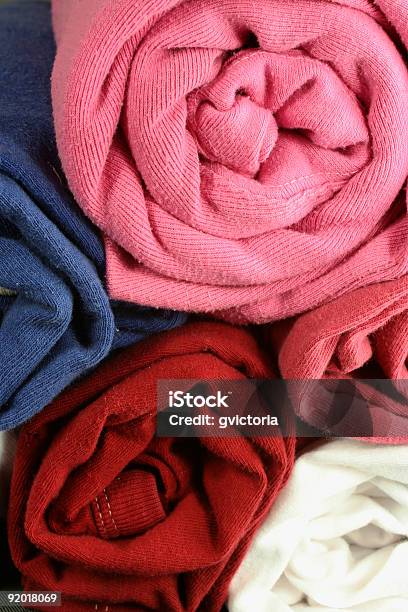 Foto de Camisas Enroladas e mais fotos de stock de Algodão - Material Têxtil - Algodão - Material Têxtil, Blusa - Roupa, Camisas
