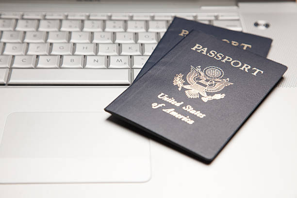 istock Passports on Laptop Keyboard 92018118