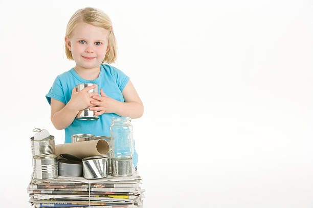 istock Young Girl Holding Recycling 92018583