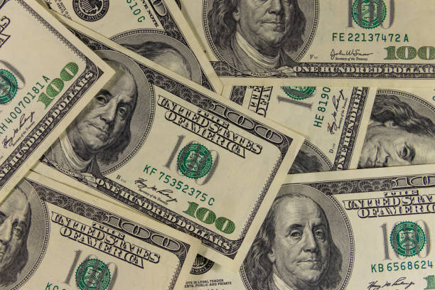 istock Background of one hundred dollar bills 920188816