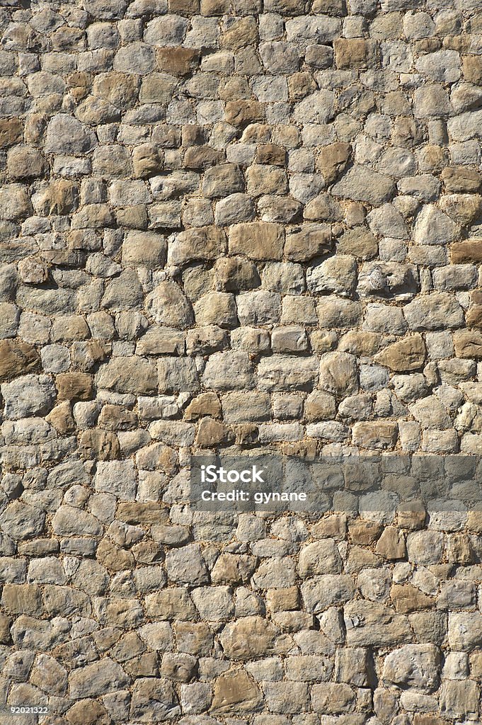 Detalle de una pared de piedra - Foto de stock de Abstracto libre de derechos