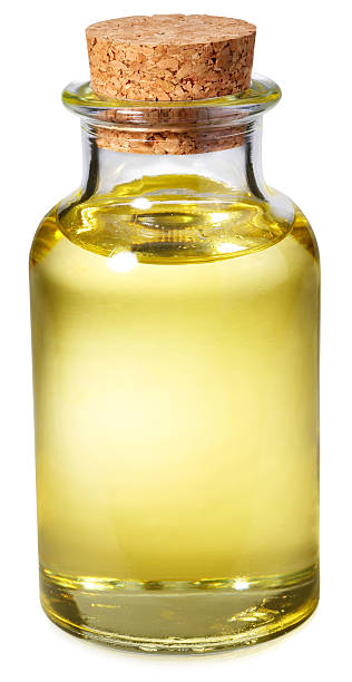 istock Bottle of sunflower-seed oil on a white background 92021667