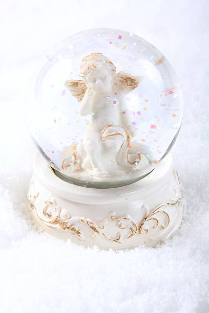 istock image of angel in glass sphere 92021781