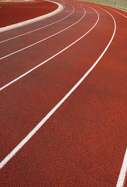 istock Curve of a Red Running Track 92023089