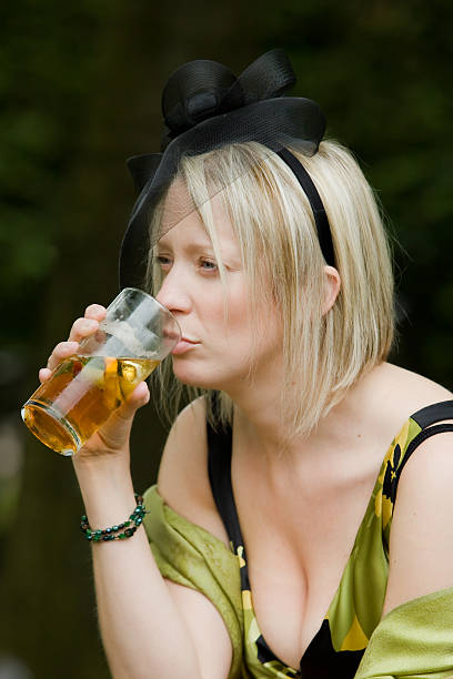 istock Party girl enjoying a drink 92023990