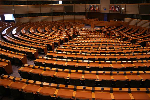 istock Large spiral assembly room with rows of seating 92024013