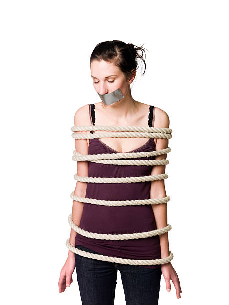 Tied up woman  bound woman stock pictures, royalty-free photos & images