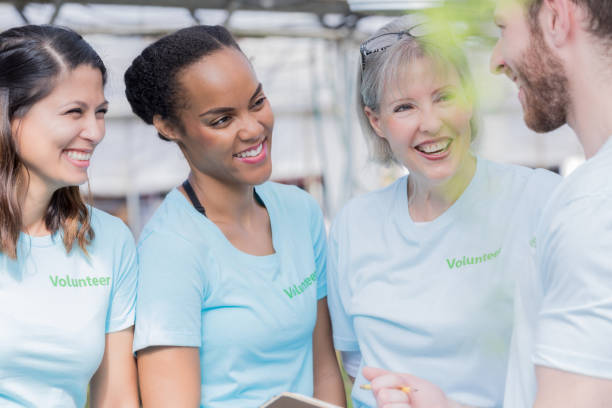 istock Plant nursery volunteers receive instructions from volunteer coordinator 920249986
