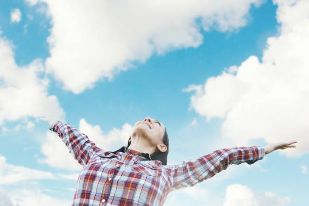 istock Young girl spreading hands with joy 920255052