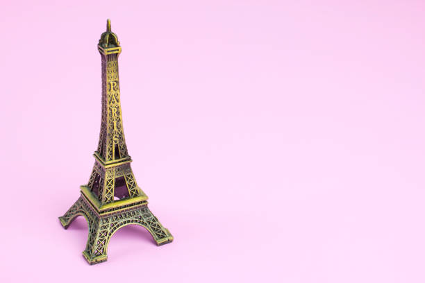 istock Souvenir Eiffel Tower on pink paper background. 920260286