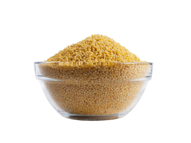 istock Bowl full of millet isolated on white 920263128