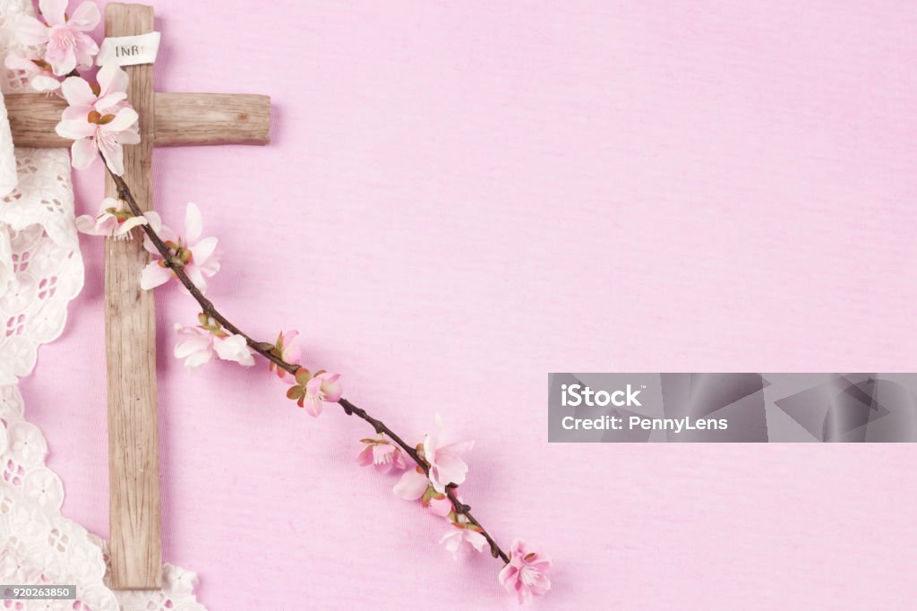 Easter wooden cross easter cross with flowers of cherry blossom Religious Cross Stock Photo