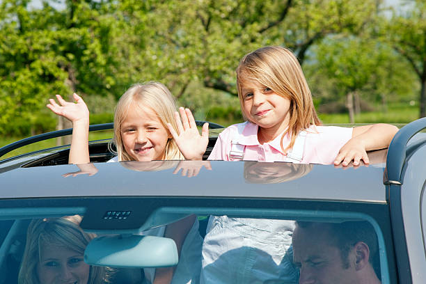 istock Family in a car with two kids 92026473
