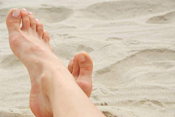 istock Woman feet beach 92026983