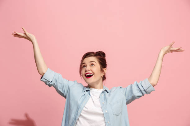 istock Winning success woman happy ecstatic celebrating being a winner. Dynamic energetic image of female model 920273038