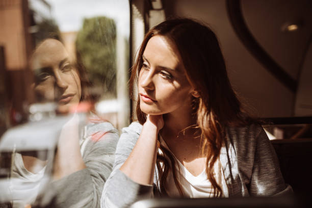 istock woman on the bus in london 920273206