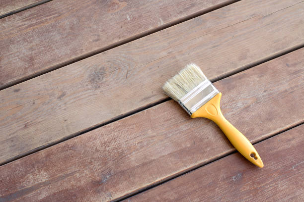 istock Paint brush on the wooden floor 920273498